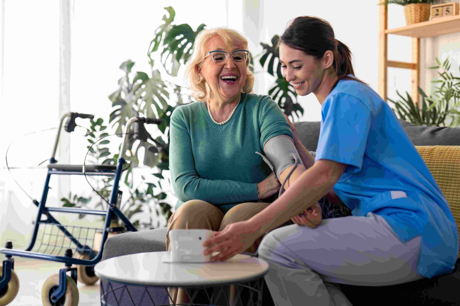 A nurse completing a home health and blood pressure check
