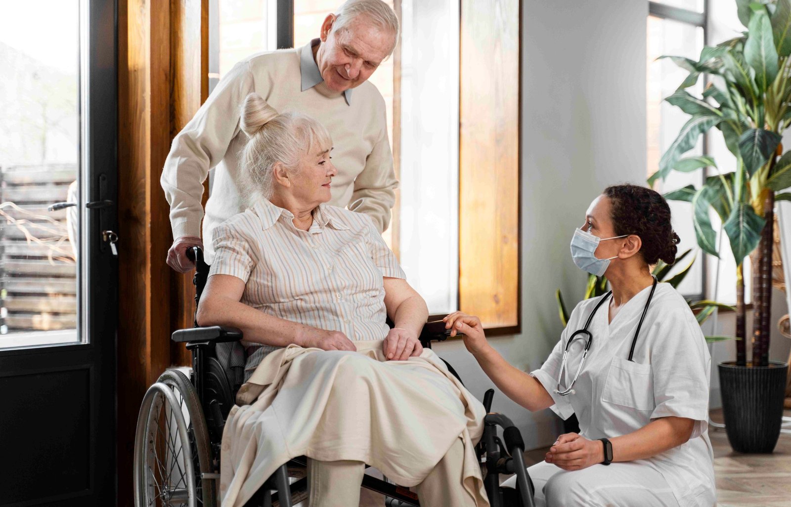 A nurse discussing personalised home care with an older couple